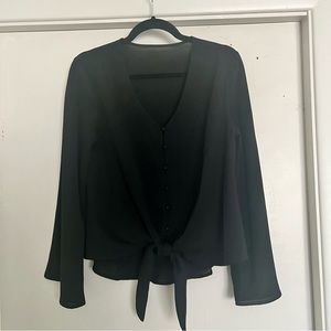Black top with tie at bottom
